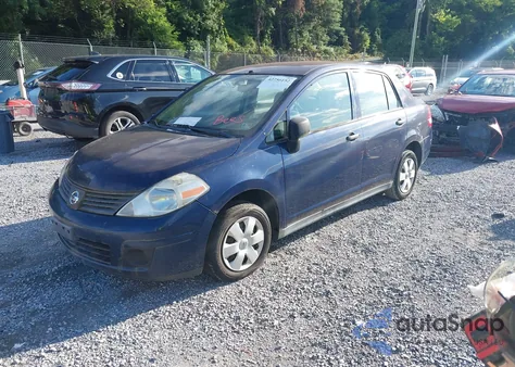 2009 Nissan Versa 1.6 Base z USA, uszkodzony, nr VIN 3N1CC11E19L458511